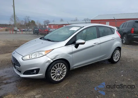 2014 Ford Fiesta Titanium z USA, uszkodzony, nr VIN 3FADP4FJ5EM243379